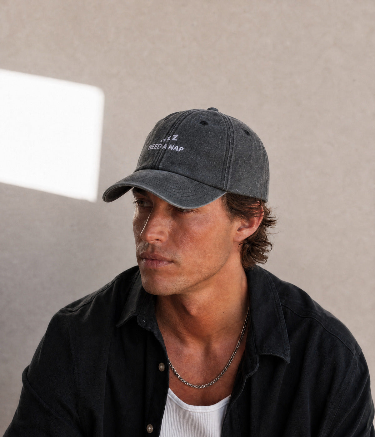 NEED A NAP. worn by a man