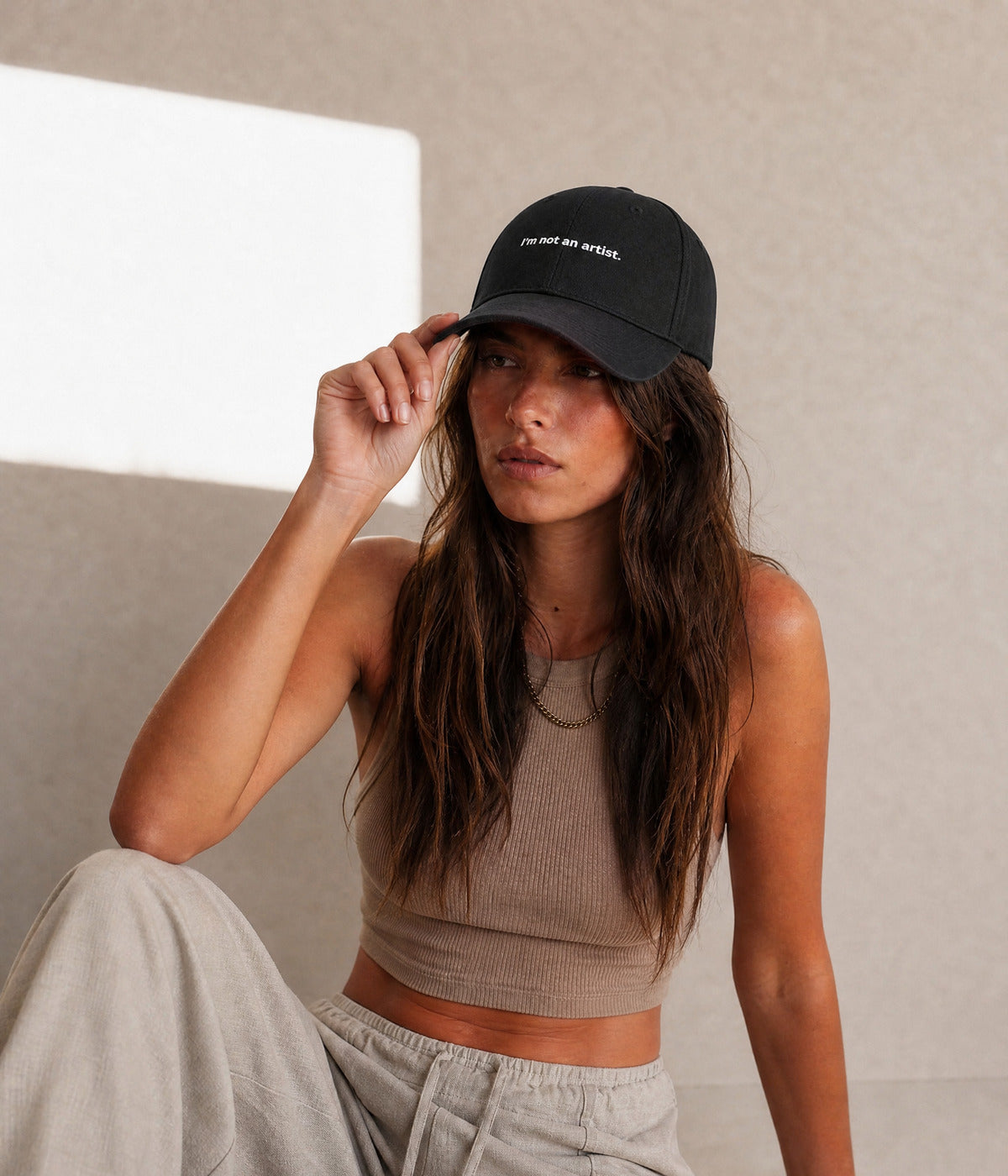NOT AN ARTIST. worn by a woman