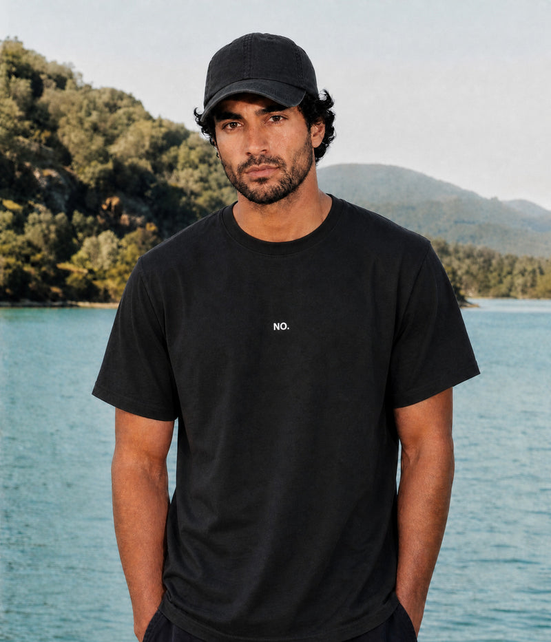 NO TEE. BLACK worn by a man