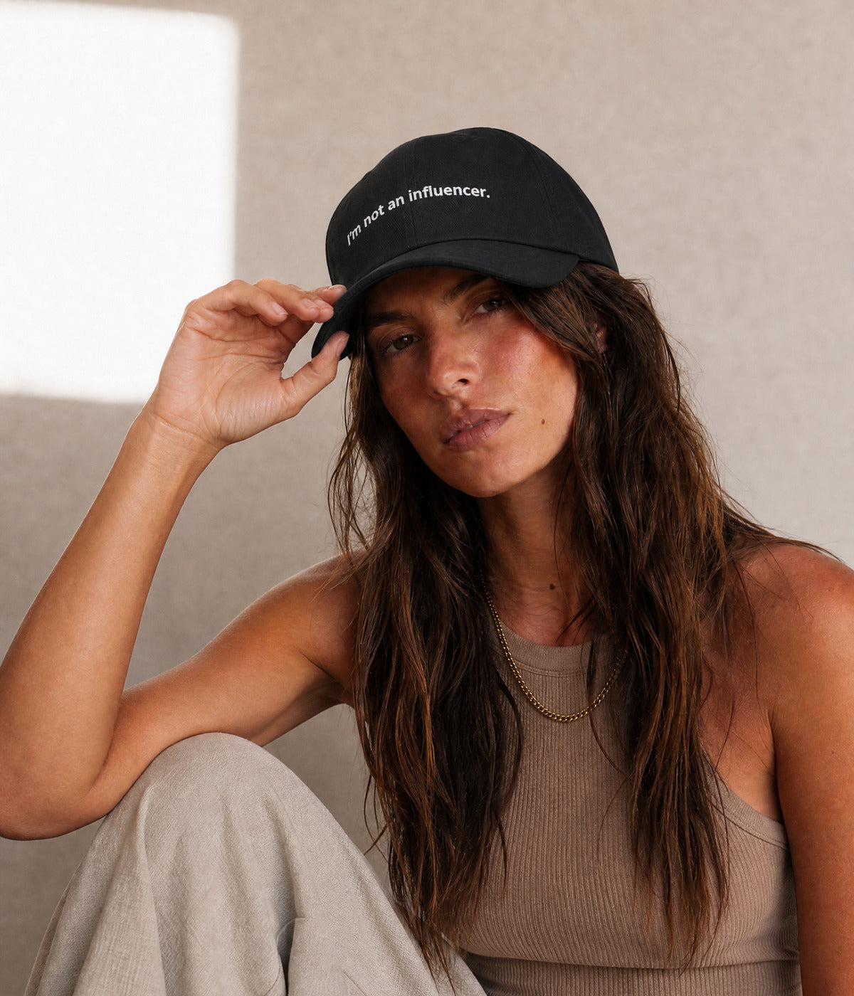 NOT AN INFLUENCER. worn by a woman