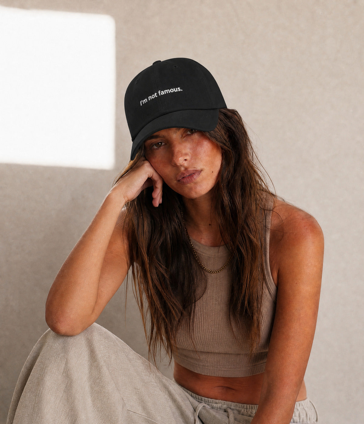 NOT FAMOUS. worn by a woman