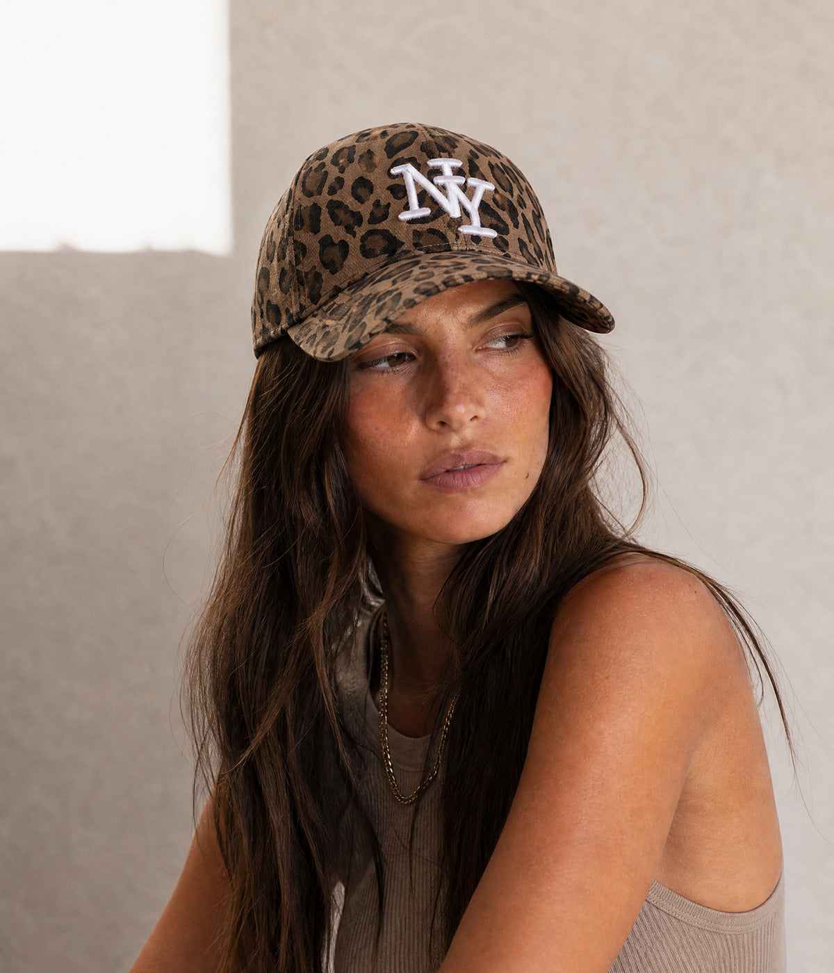 NY LEOPARD. BROWN worn by a woman