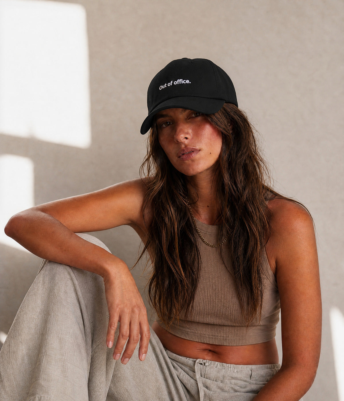 OUT OF OFFICE - DAD CAP. worn by a woman