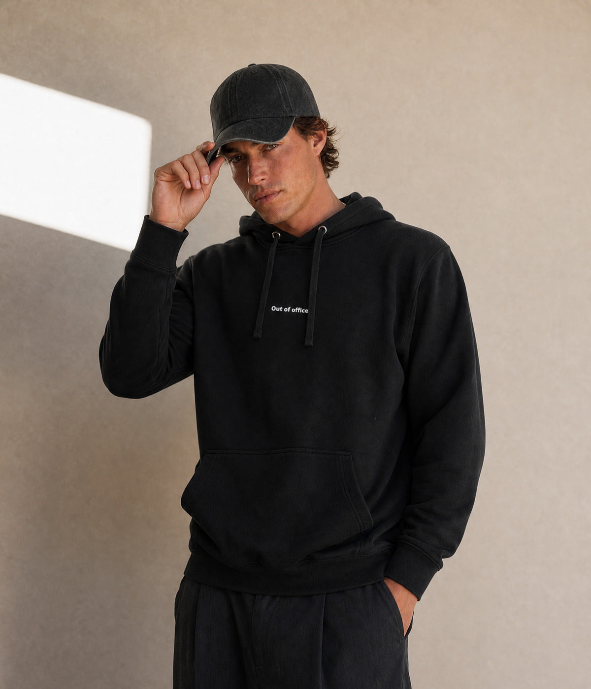 OUT OF OFFICE HOODIE. on model
