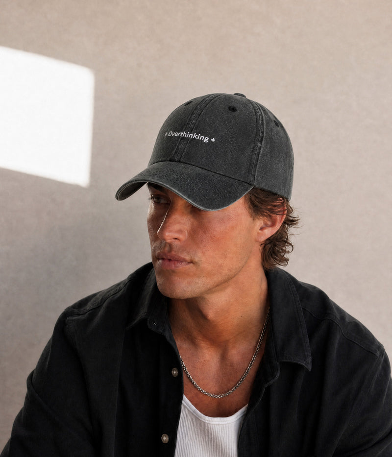 OVERTHINKING. BLACK worn by a man