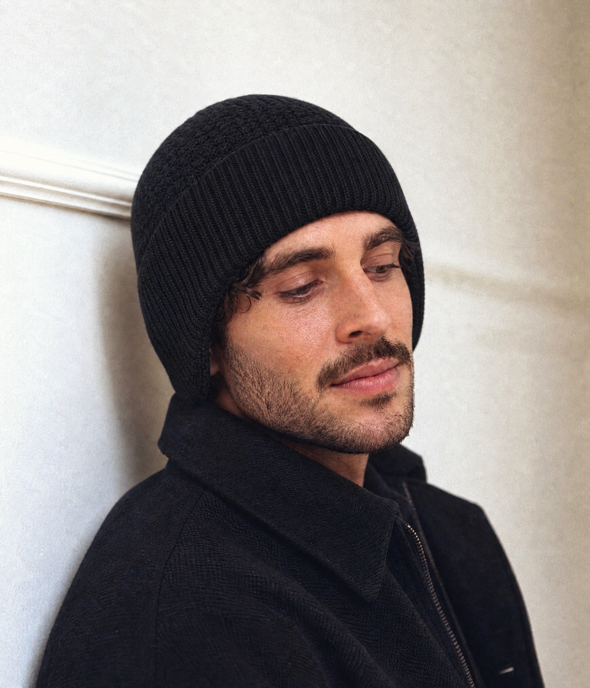 PATTERNED EARMUFF BEANIE. — BLACK worn