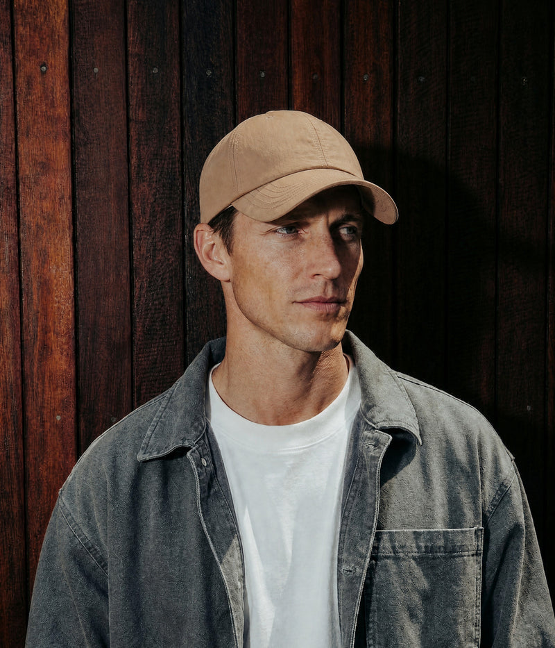 PERFORM. LIGHT BROWN worn by a man