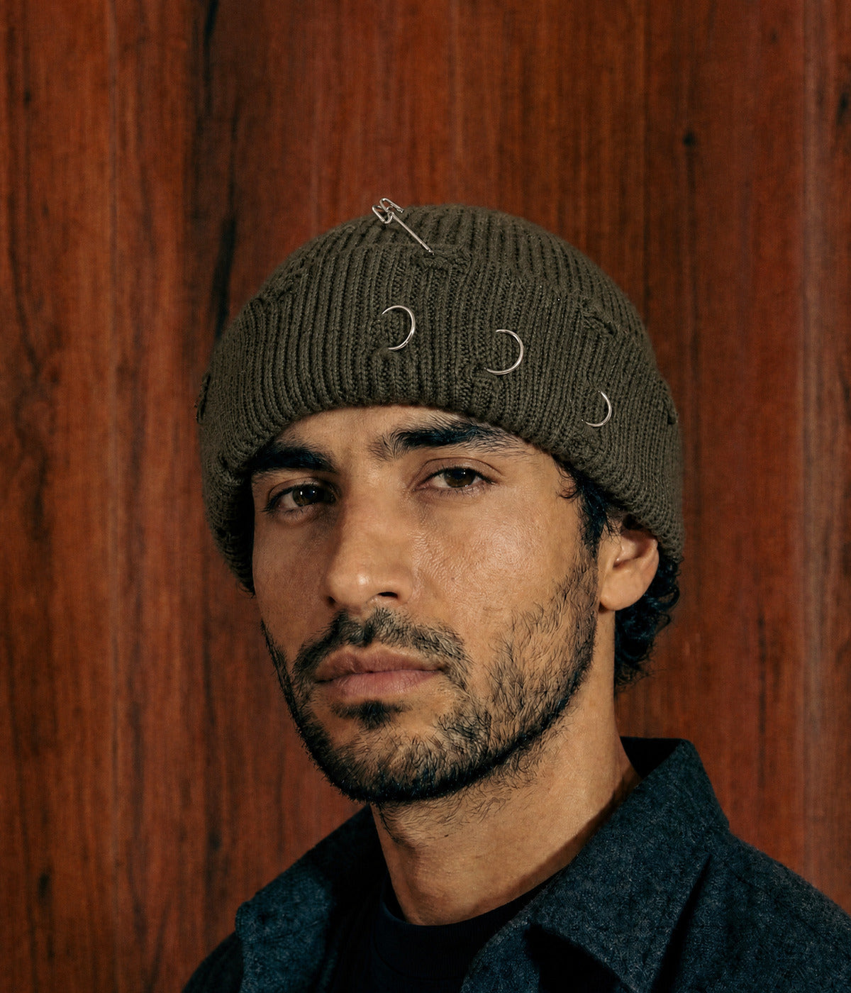 PIERCED FISHERMAN BEANIE. — ARMY GREEN worn