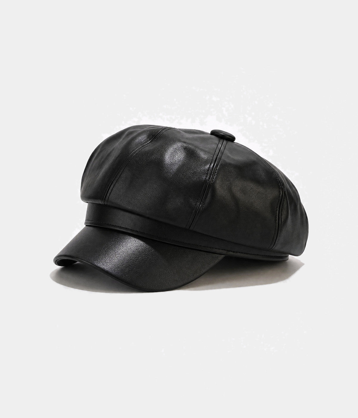 FAUX LEATHER NEWSBOY. faux-leather newsboy cap in BLACK, side view