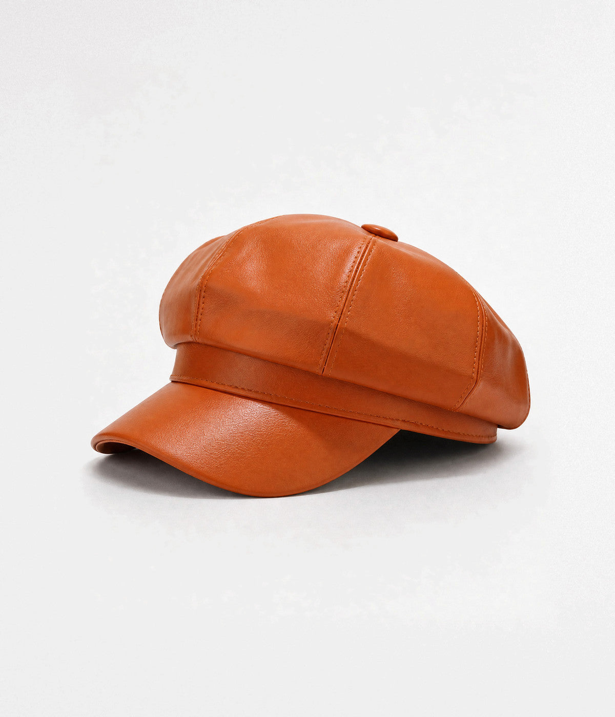 FAUX LEATHER NEWSBOY. faux-leather newsboy cap in CARAMEL, side view