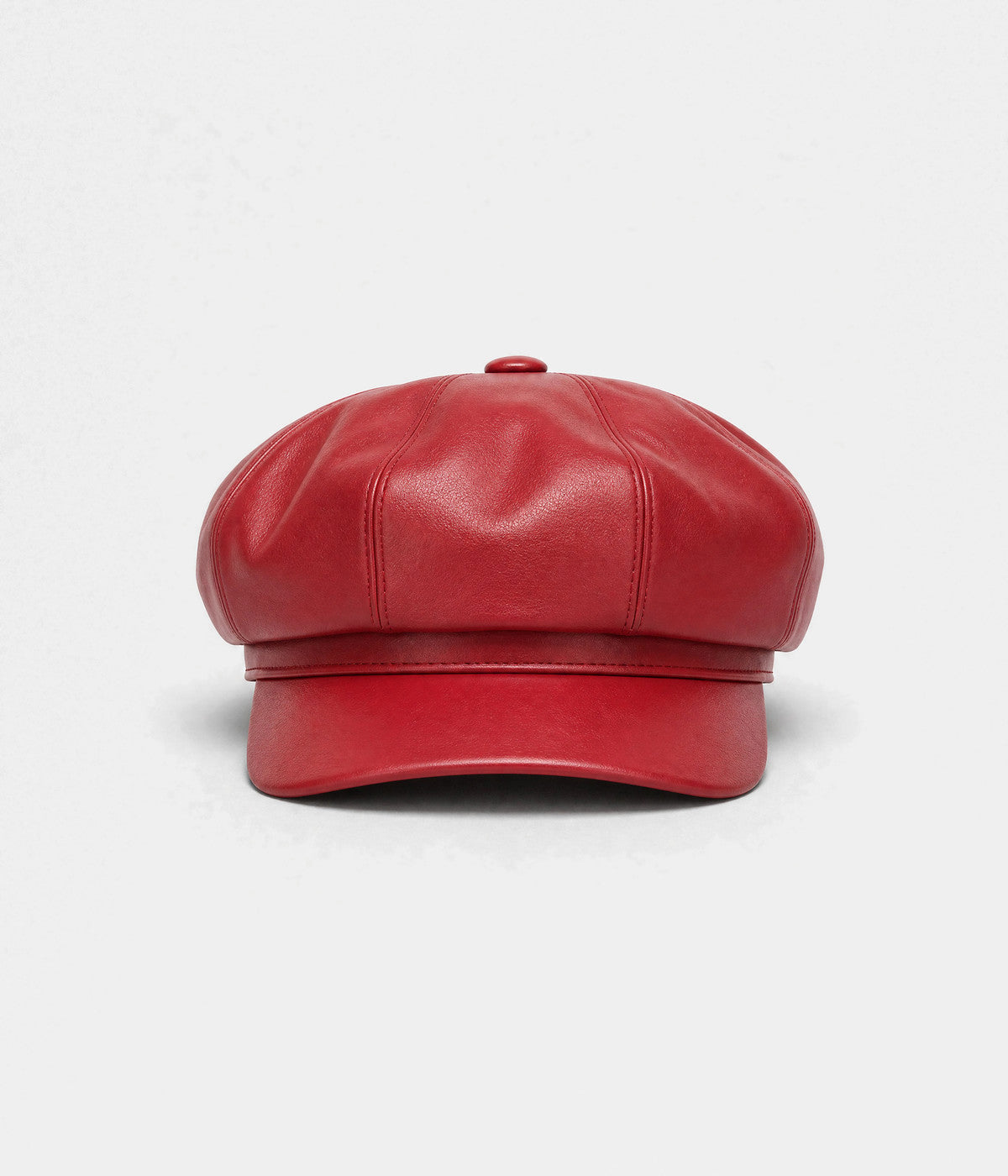 FAUX LEATHER NEWSBOY. faux-leather newsboy cap in RED, front view