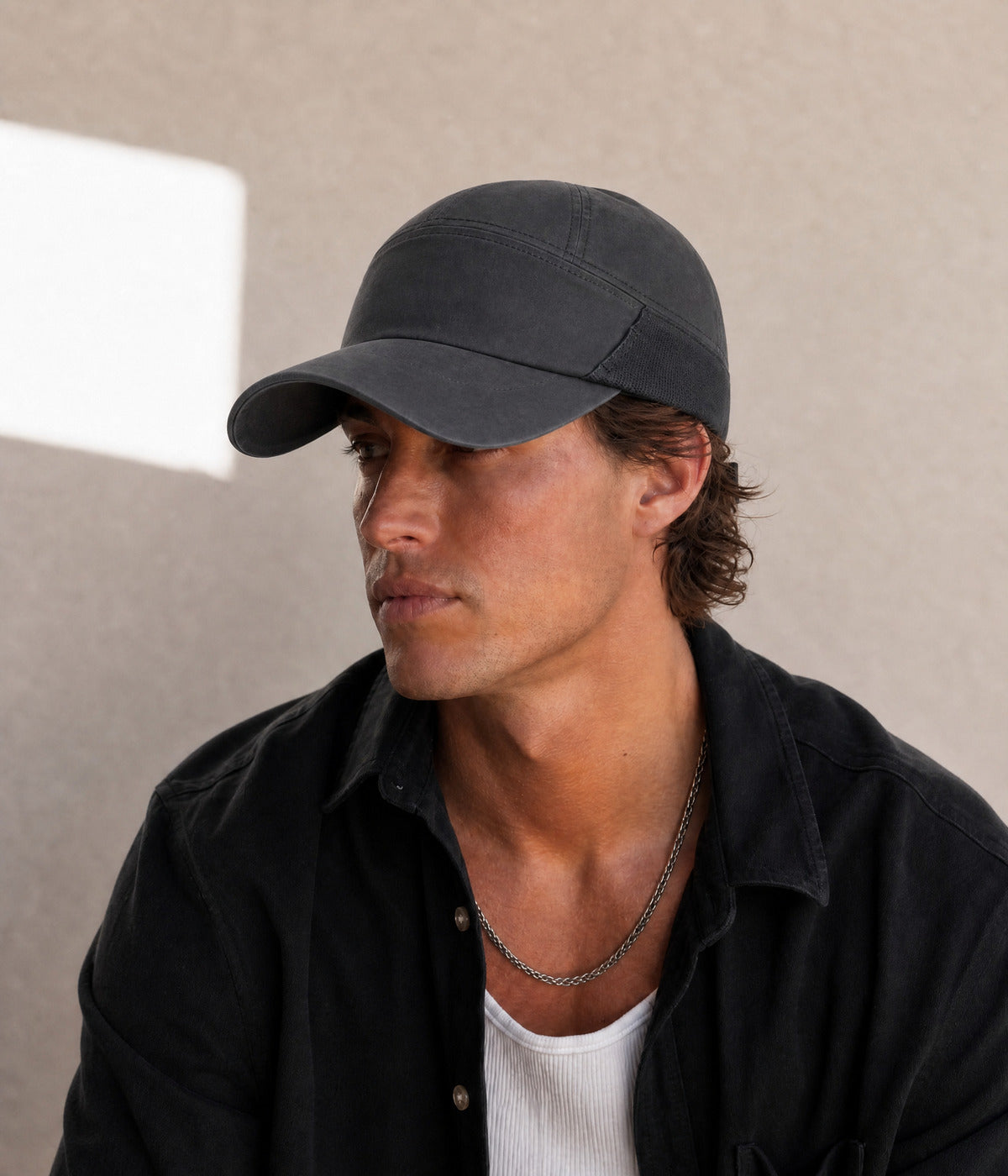 QUICK DRY KEEPER. BLACK worn by a man