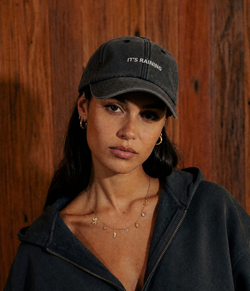 RAINING. worn by a woman