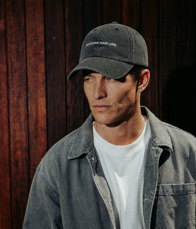 RECEDING HAIR LINE. worn by a man