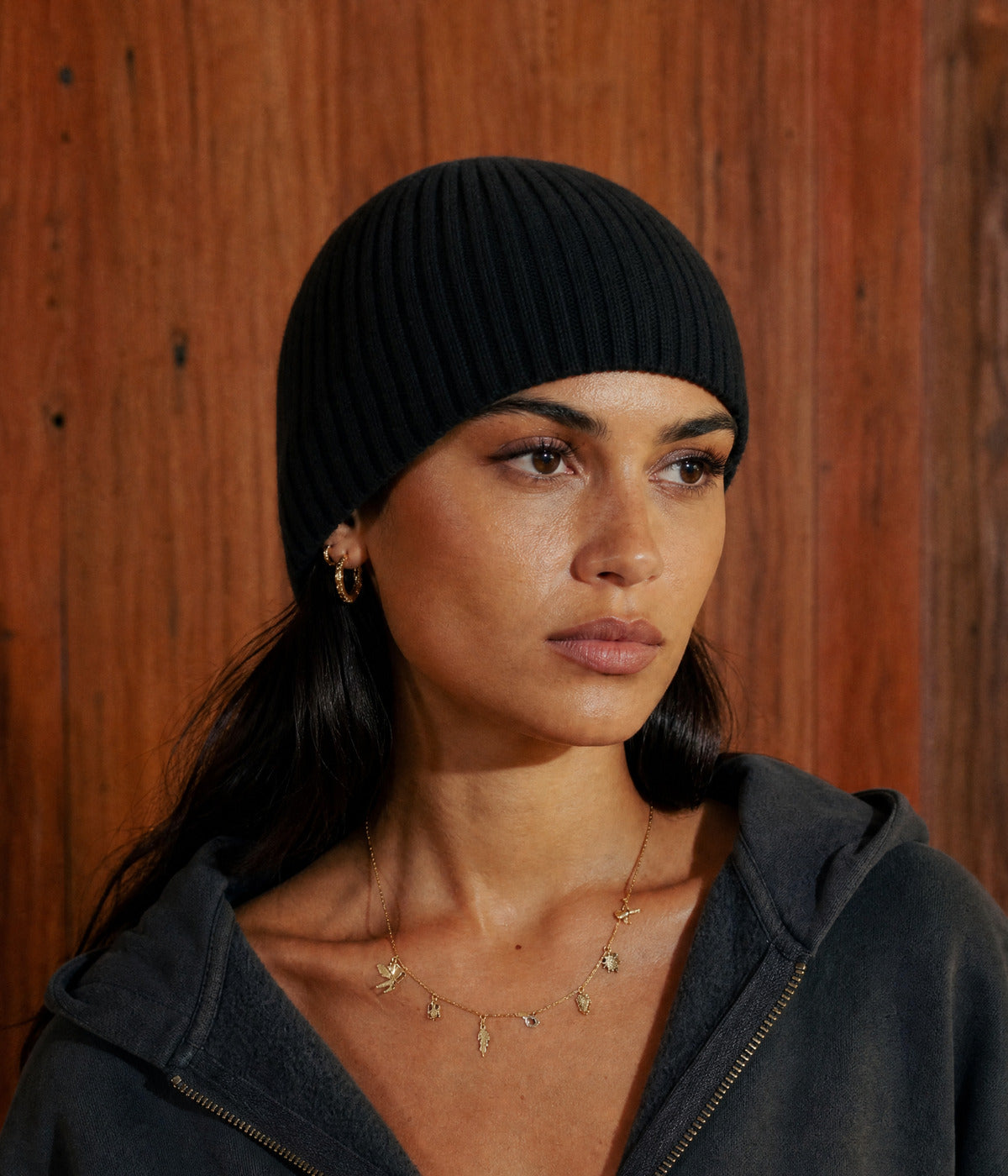 RIB KNIT BEANIE. — BLACK worn