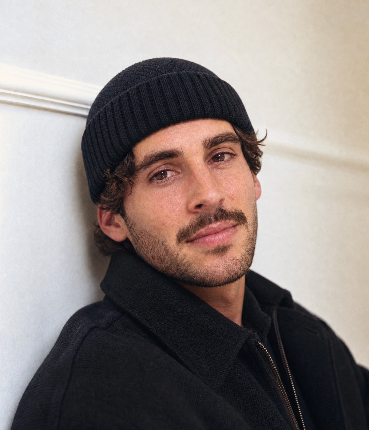 RIBBED FISHERMAN BEANIE. — BLACK worn