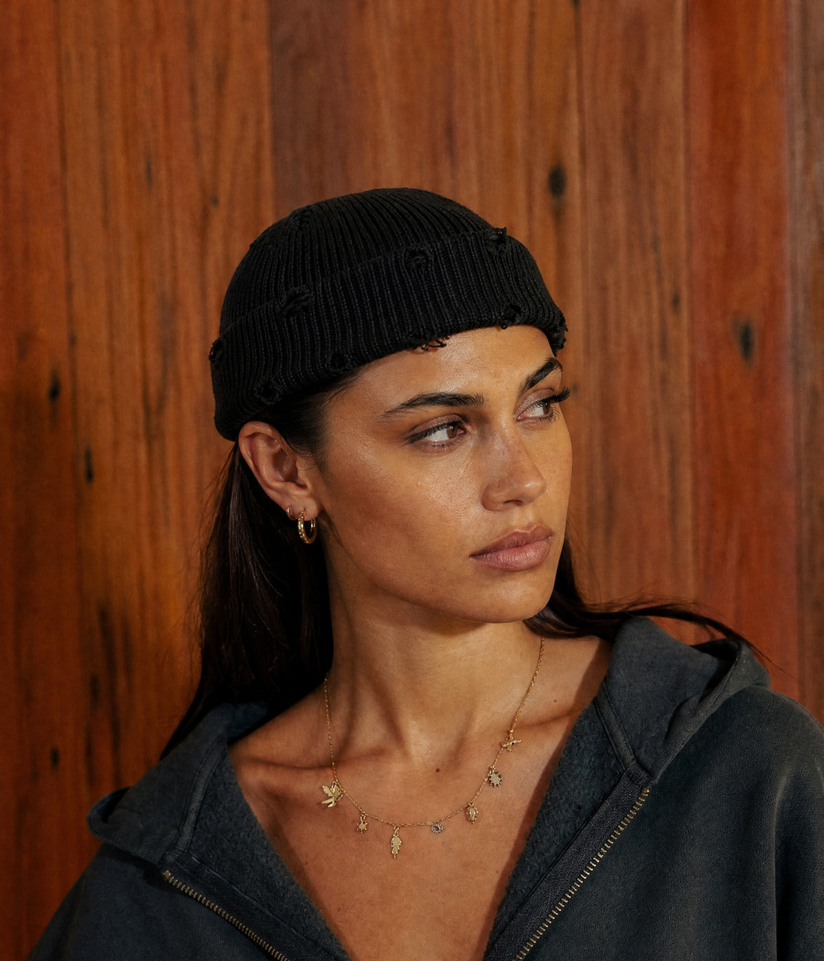 RIPPED FISHERMAN BEANIE. — BLACK worn