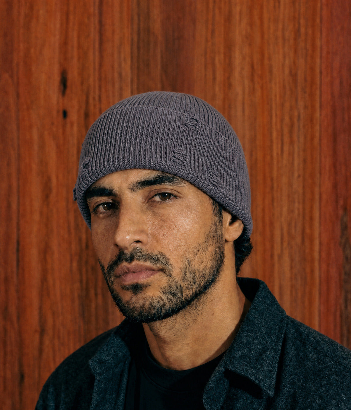 RIPPED FISHERMAN BEANIE. — DARK GRAY worn