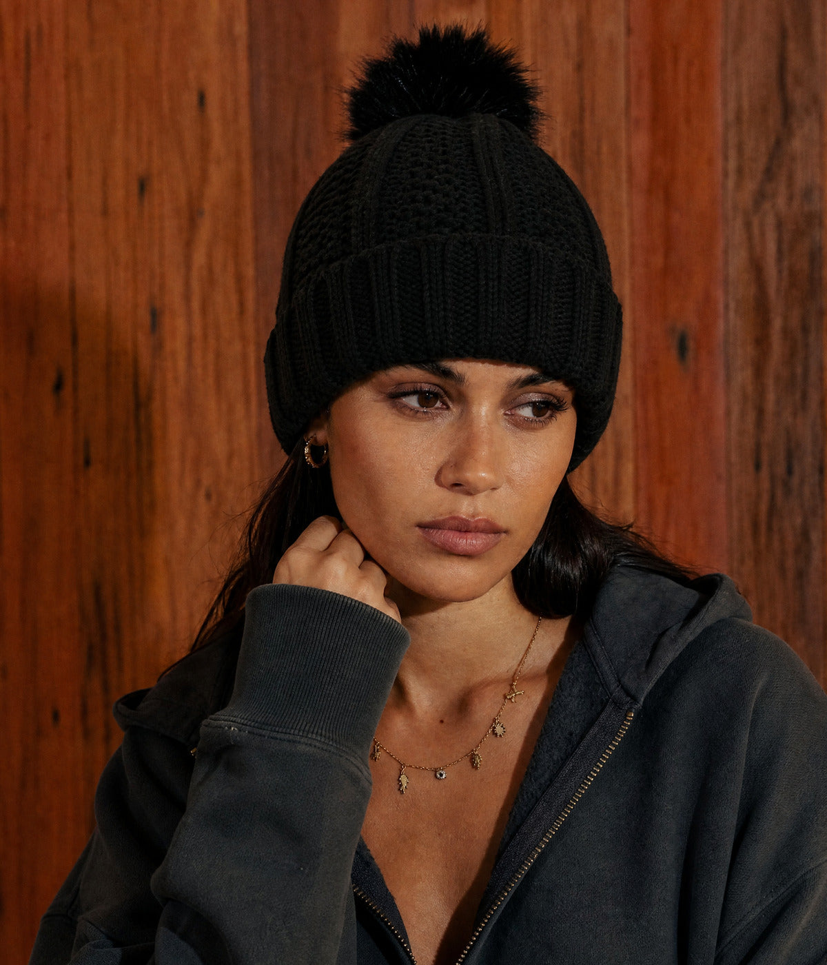 SATIN POMPOM BEANIE. — BLACK worn