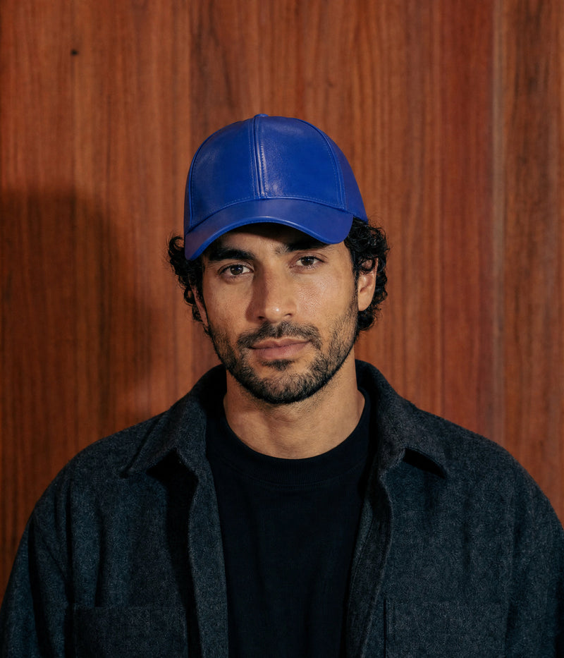 SLICK CAP. — BLUE worn