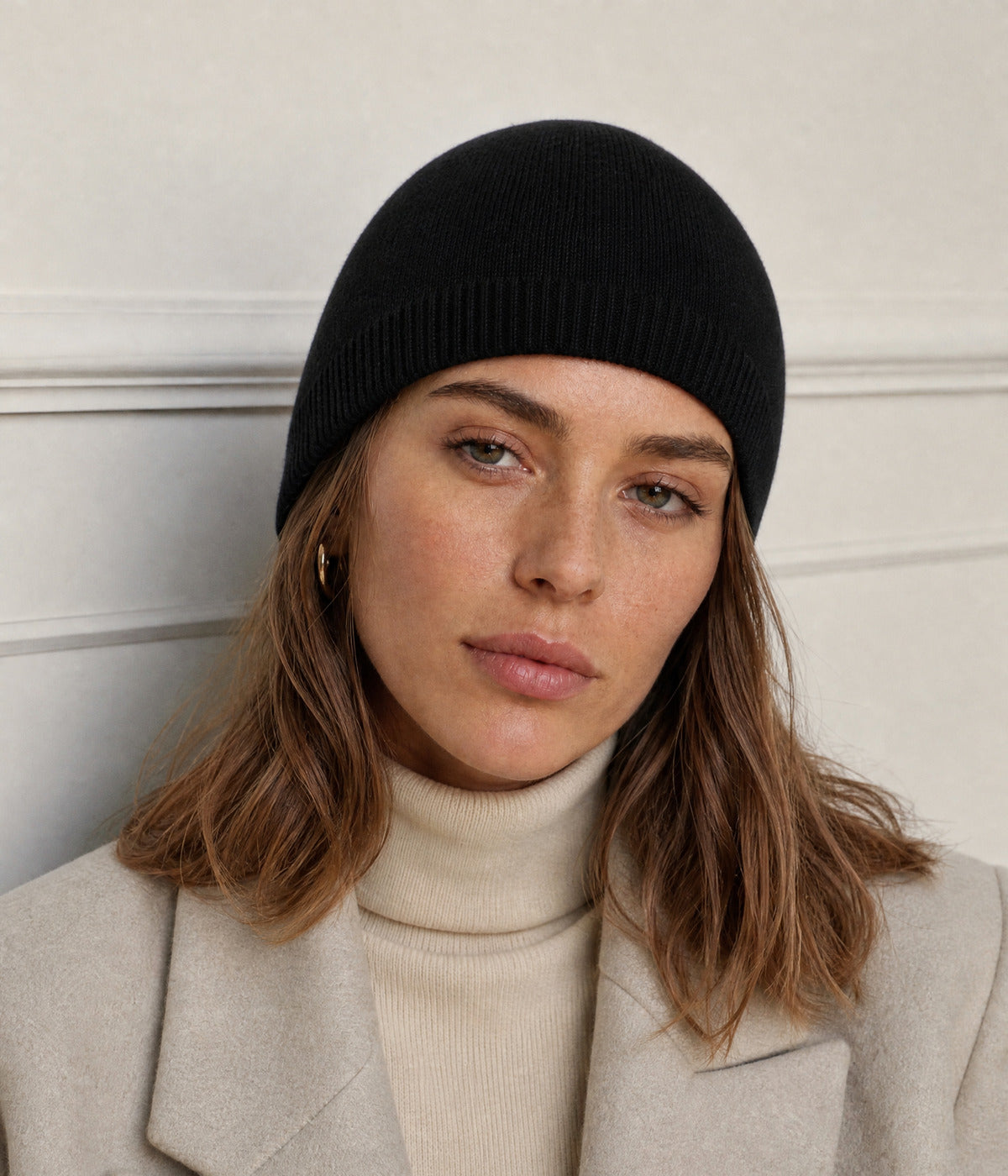 SLIM FIT BEANIE. — BLACK worn