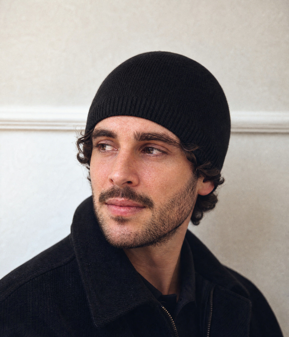 SLIM FIT BEANIE. — BLACK worn