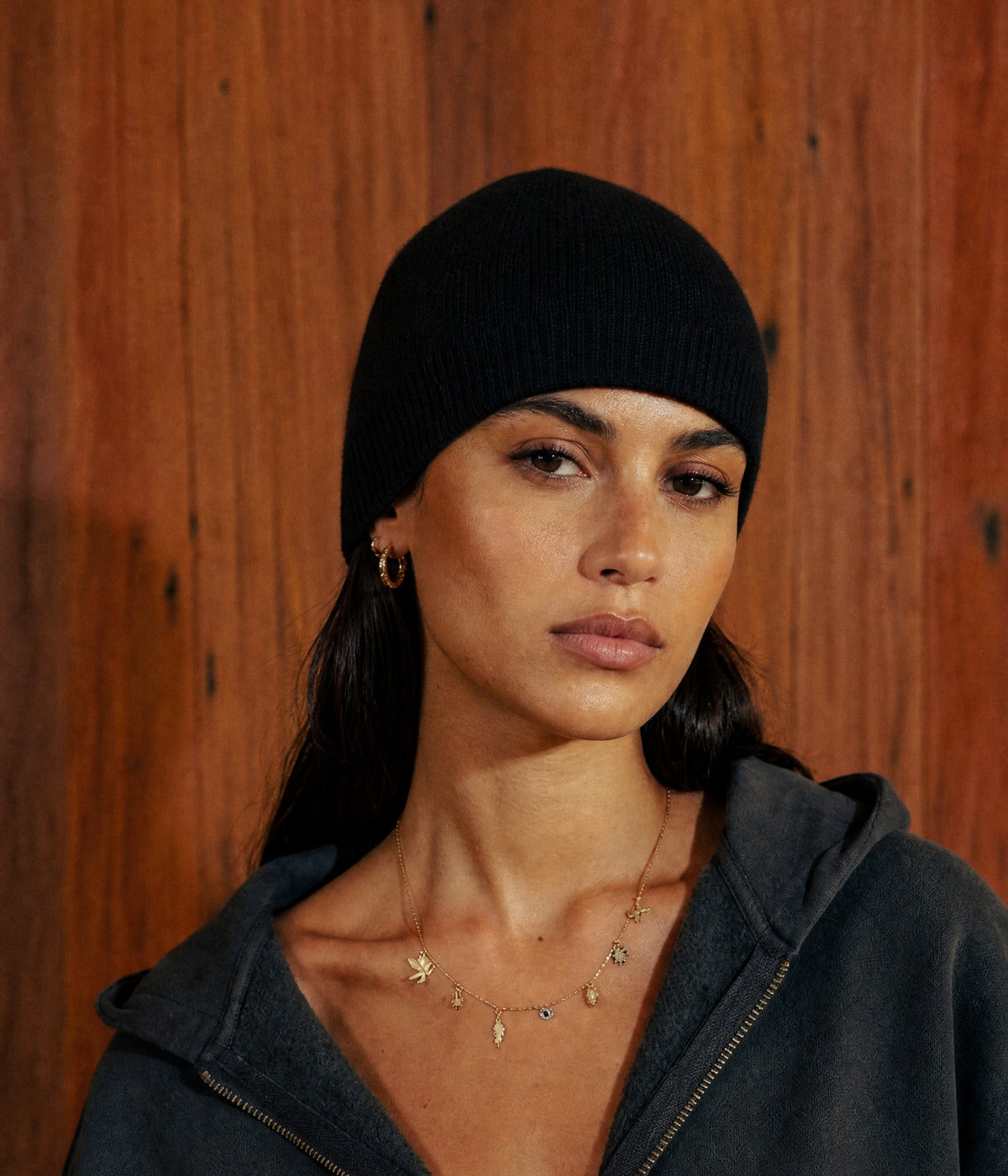 SLIM FIT BEANIE. — BLACK worn