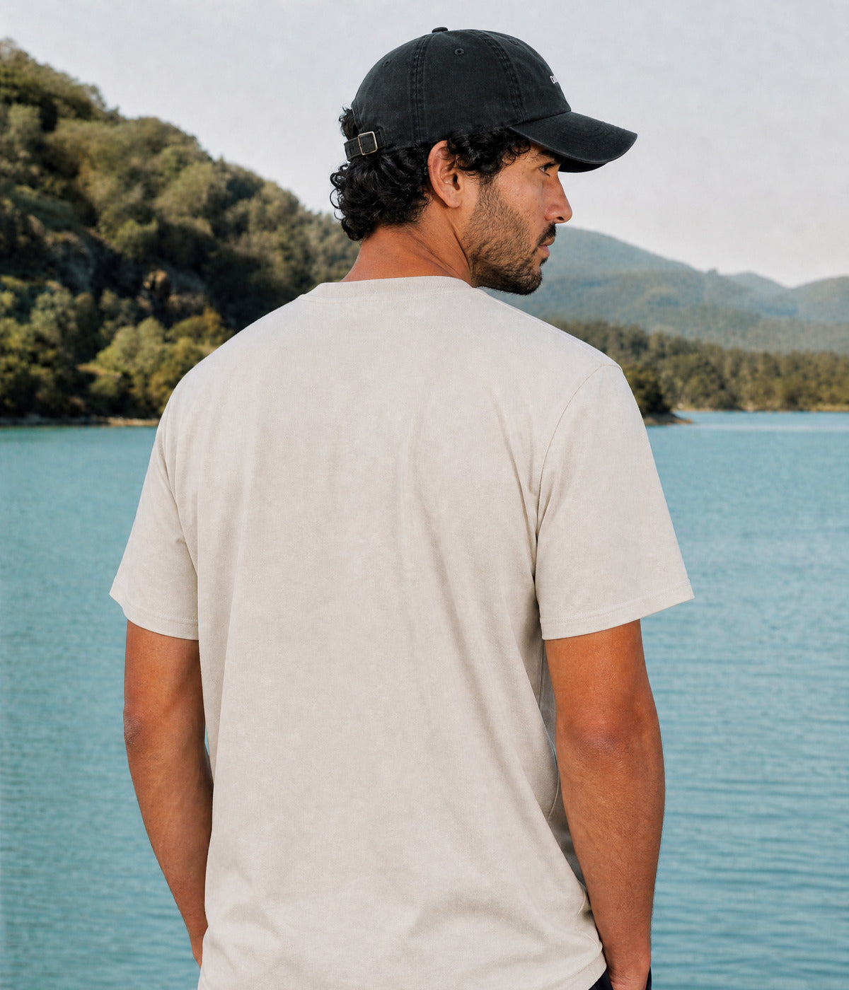 SUN TEE. BEIGE worn by a man, back view