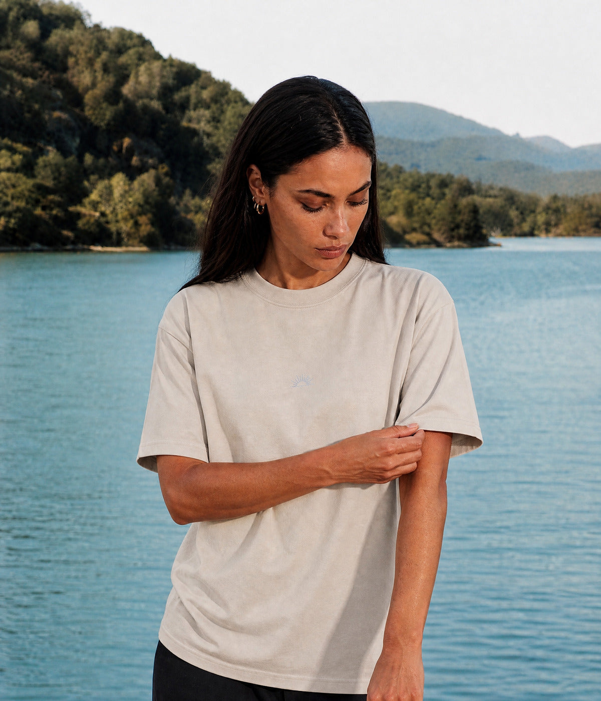 SUN TEE. BEIGE worn by a woman