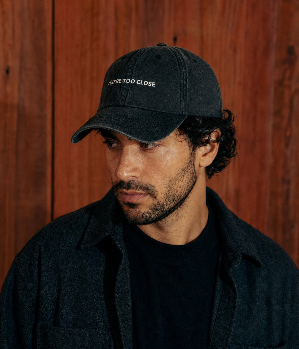 TOO CLOSE. worn by a man
