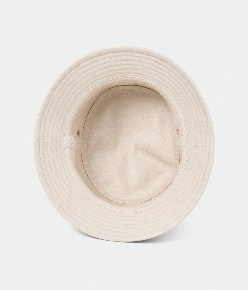 WASHED COTTON BUCKET. washed cotton bucket hat in beige, inside view