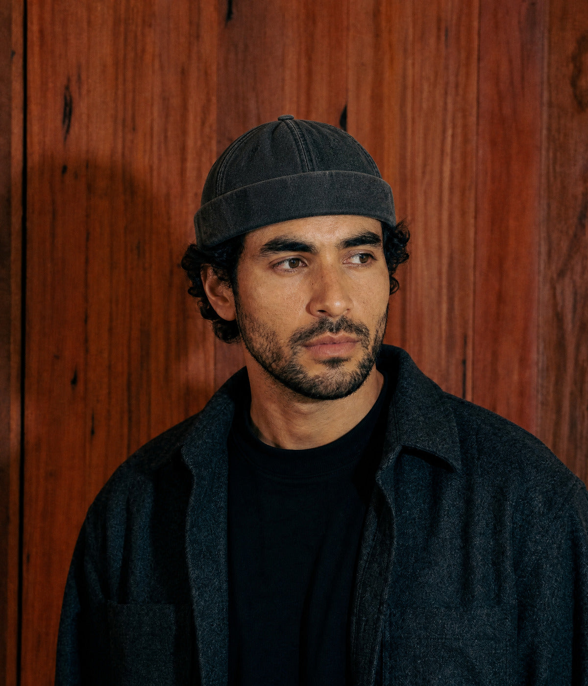 WASHED DENIM FISHERMAN BEANIE. — BLACK worn