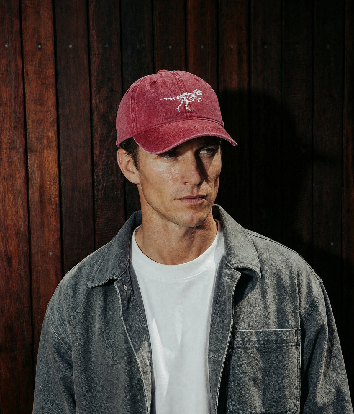WASHED DINOSAUR. RED worn by a man