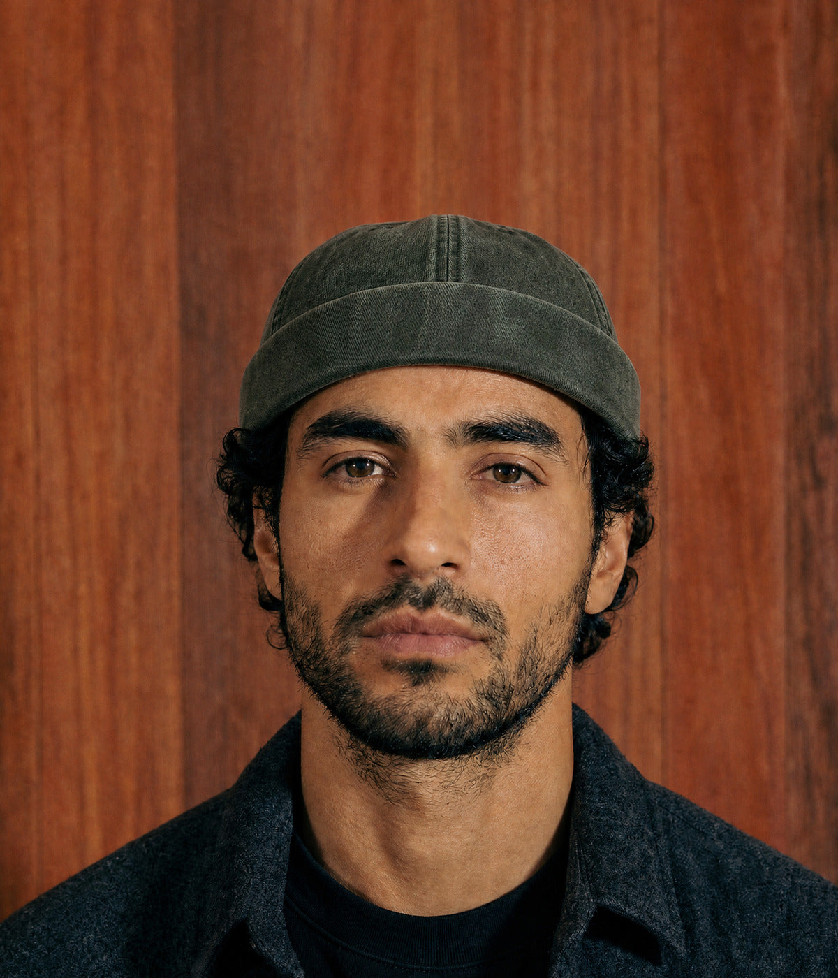 WASHED FISHERMAN BEANIE. — ARMY GREEN worn