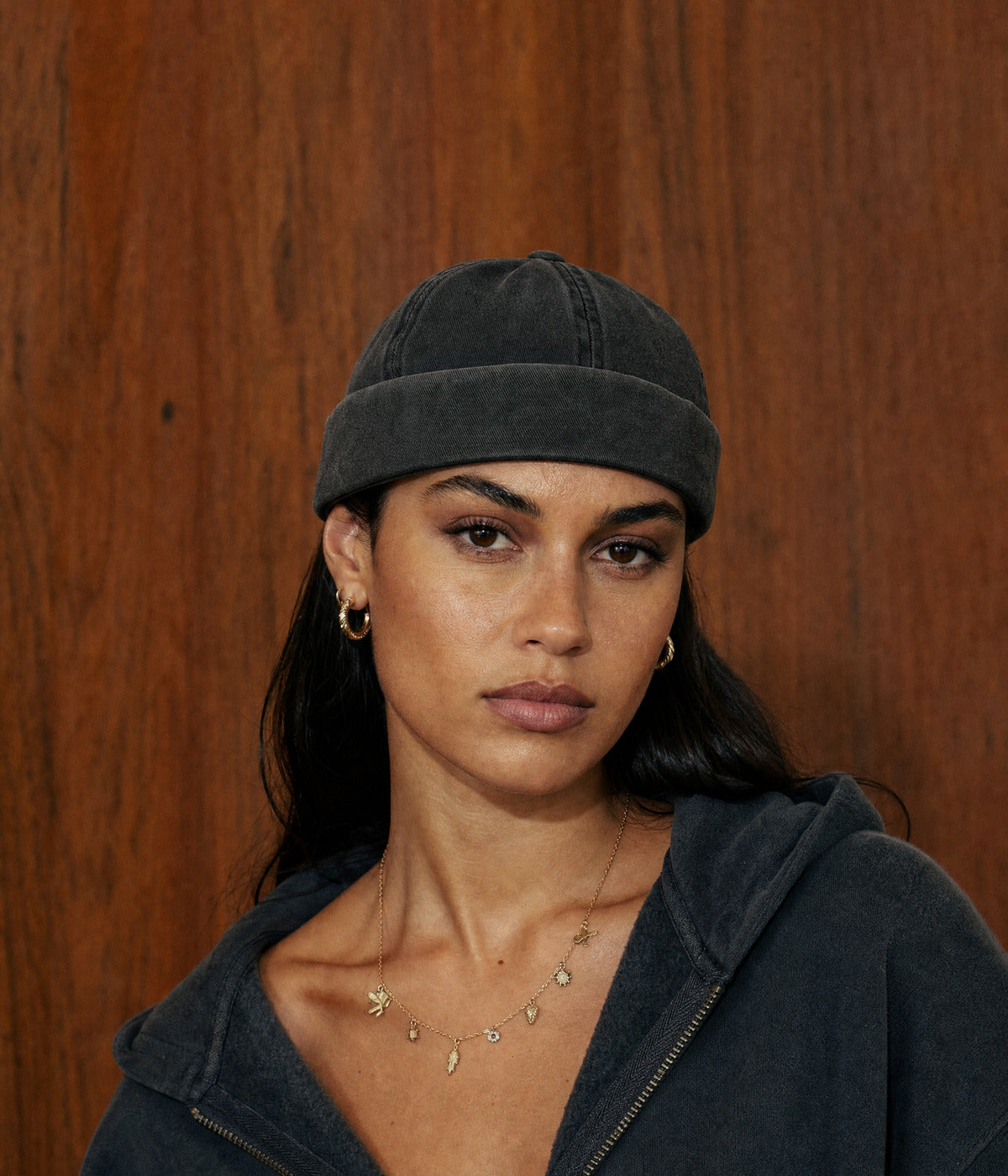 WASHED FISHERMAN BEANIE. — BLACK worn