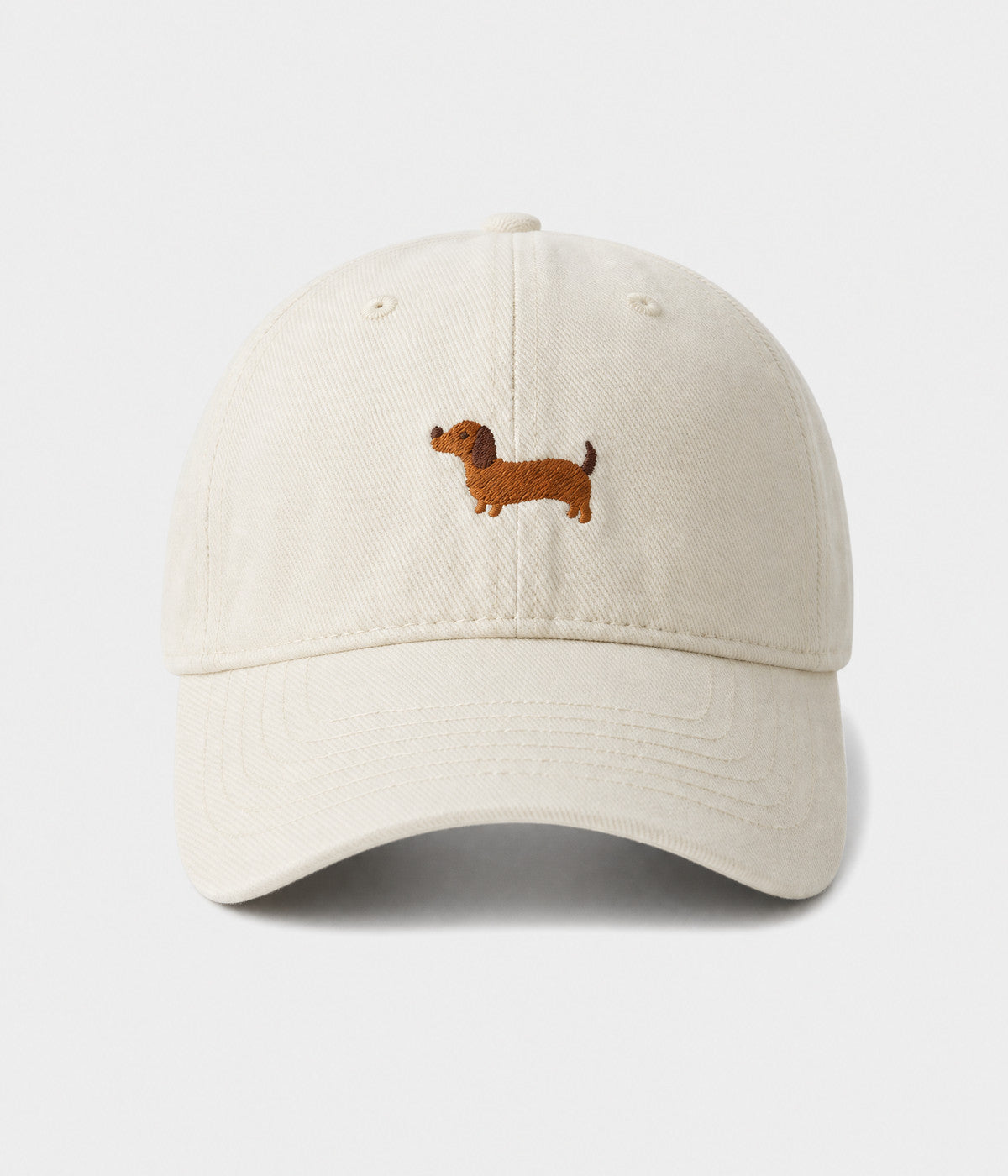 SAUSAGE DOG. washed cotton cap in white, front view