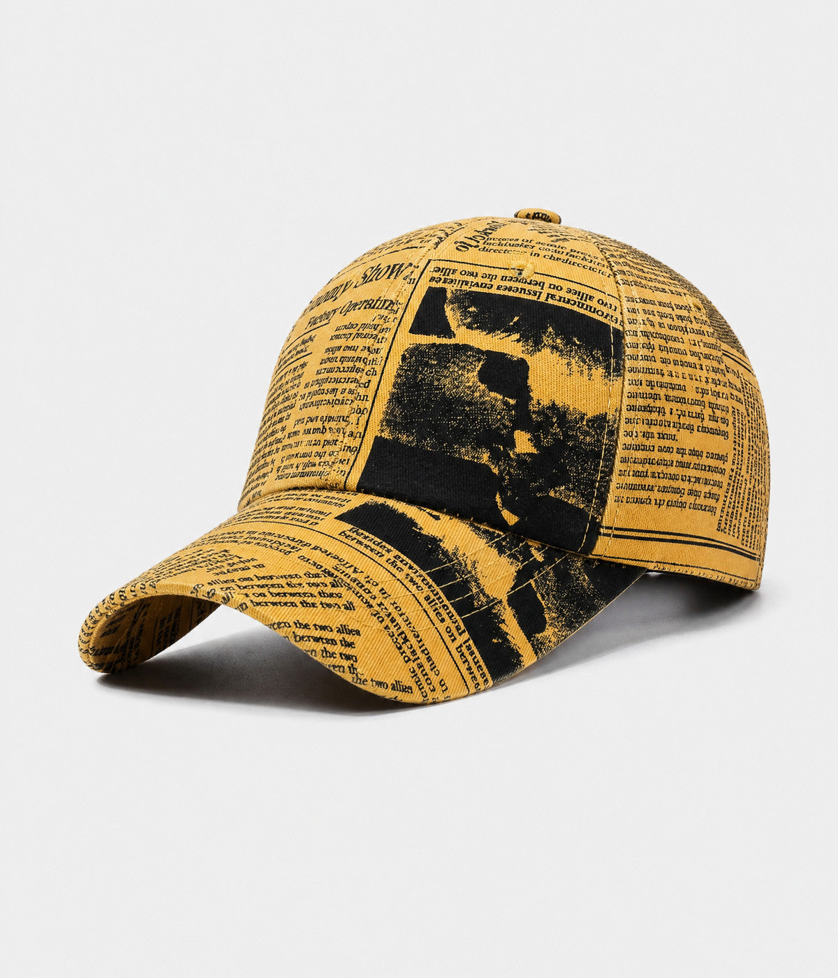 NEWSPRINT. cotton twill newsprint-print cap in yellow, side view